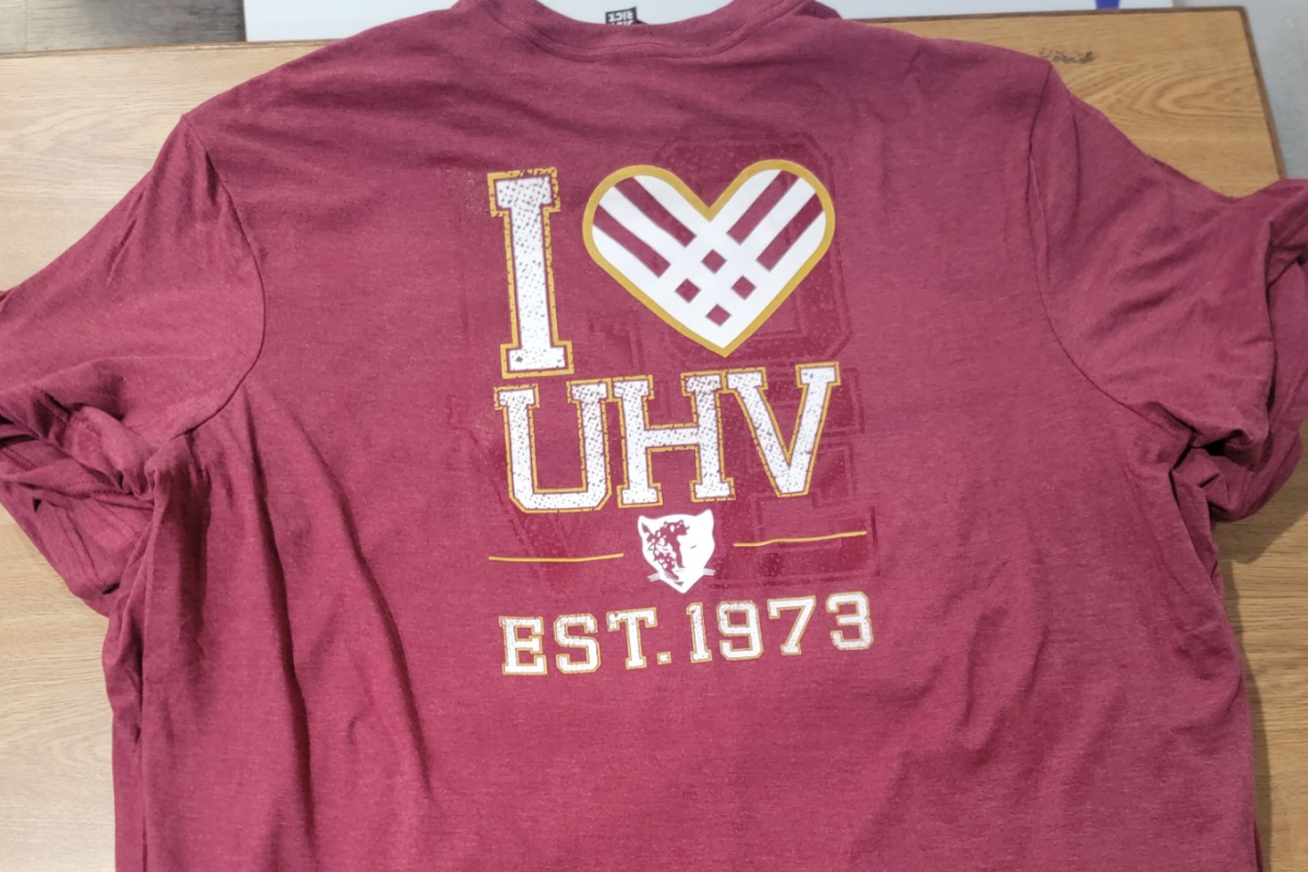 Red shirt with 'I Love UHV, Est. 1973' graphic.