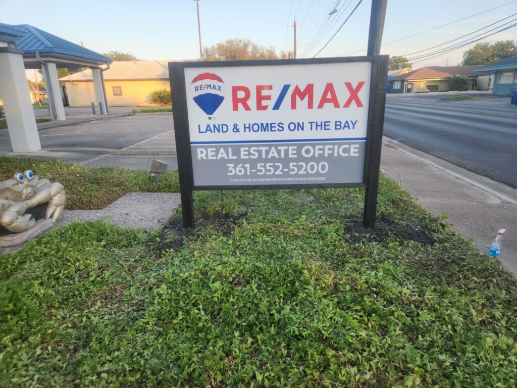 RE/MAX real estate office sign.
