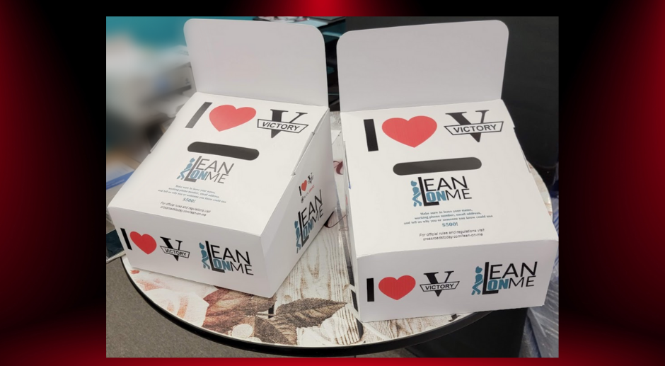 "I Love Victory" donation boxes.