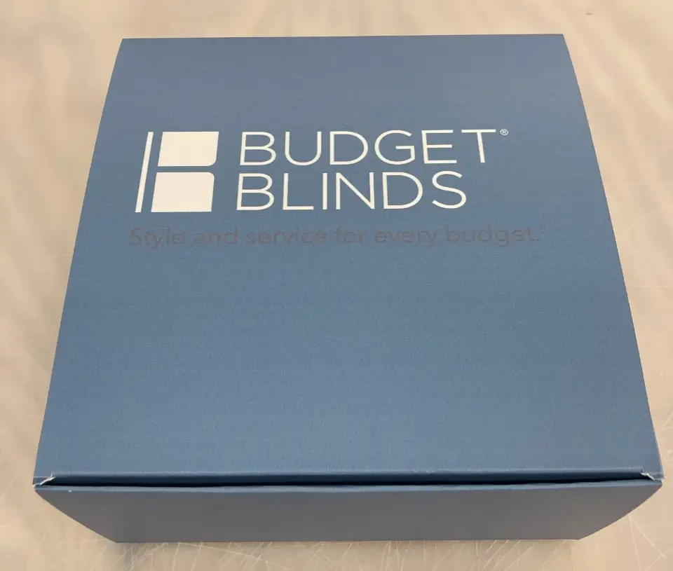 Blue Budget Blinds product box.