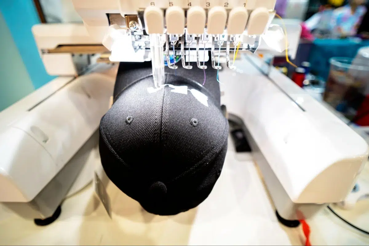 Embroidered Gifts for Employee and Client Appreciation 3 Embroidery machine stitching design on hat.